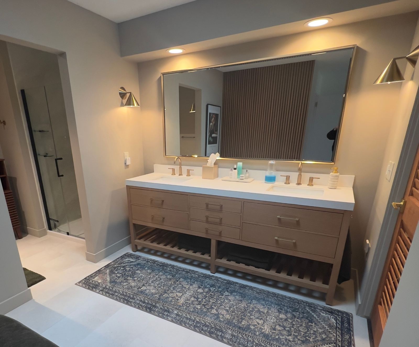 Full bathroom remodel with double vanity and walk-in shower