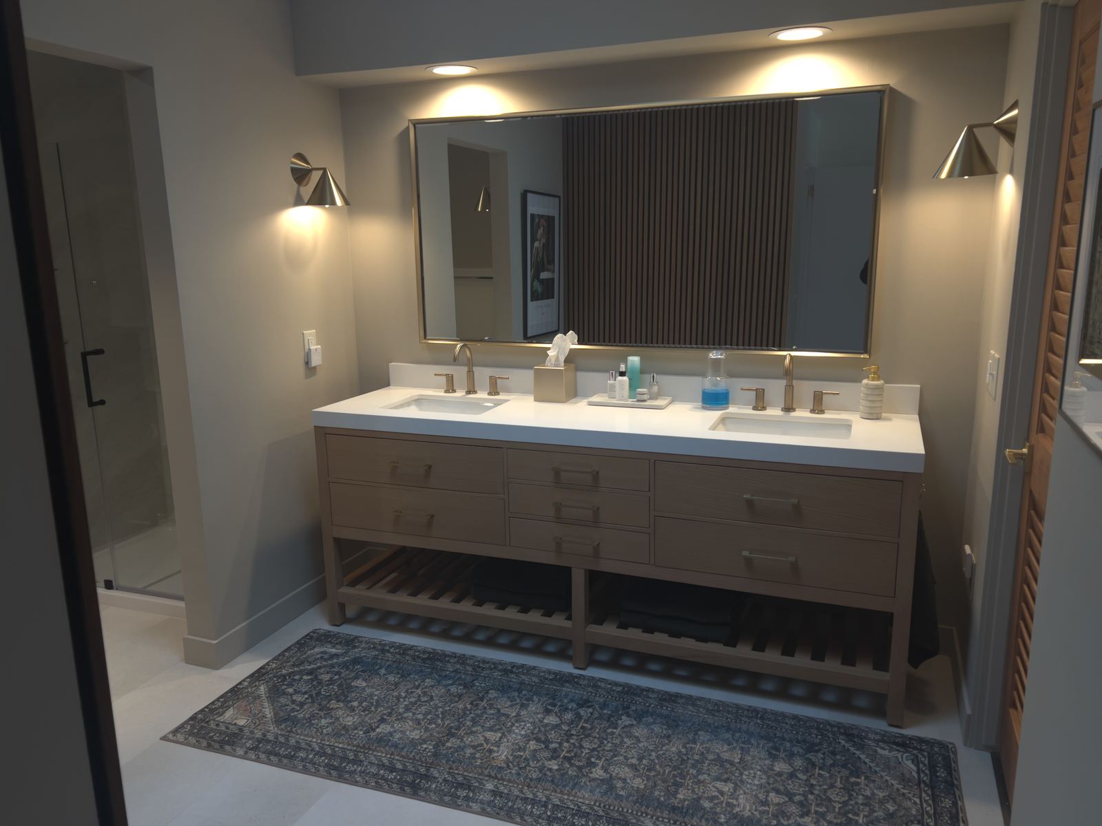 Custom oak double vanity with quartz counter and brass fixtures
