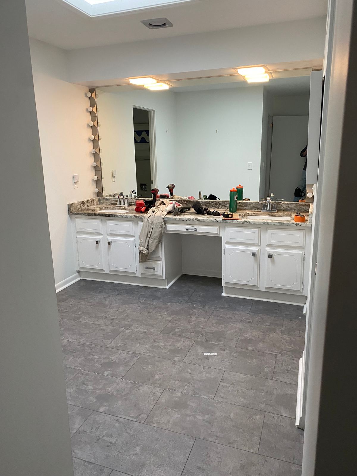 Original double vanity with skylight before renovation